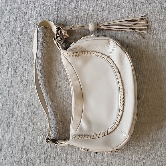 Sereta Handbags - SERETA small beige leather shoulder bag. Tassel.